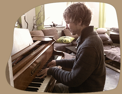 Emmanuel on the piano